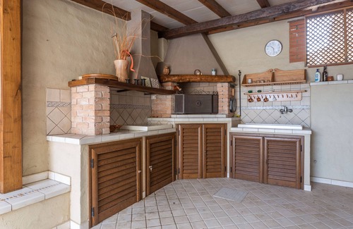 S'Archittu House | Holiday Home 'Villetta Al Mare - S'archittu' with Private Garden, Wi-Fi and Air Conditioning