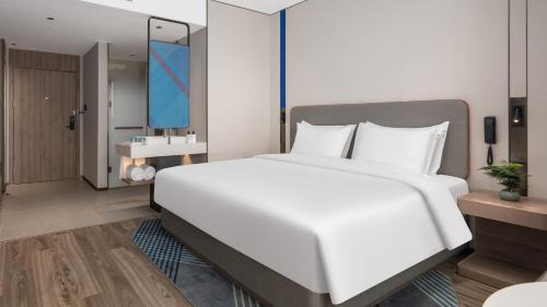 Chengyang Hotel | Holiday Inn Express Qingdao Hongdao Station by IHG - Qingdao International Airport
