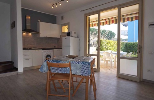 Porto Santa Margherita House | Holiday home in holiday village with swimming pool
