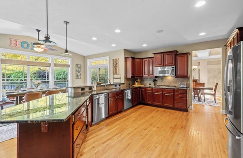 Fayetteville House | Home theater, pool, spa close to SU, Downtown