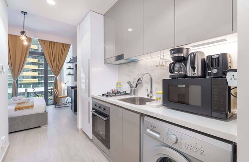 Nad Al Sheba Apartment | Homey Studio Apartment Perfect for 2 at Azizi Riviera 46