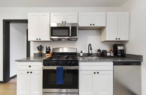 Lower Lawrenceville Apartment | ★ HostWise Stays ★ Off Street Parking, Central Lawrenceville, Butler St. Apartment!