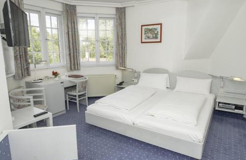 Gauting Hotel | Hotel Gautinger Hof - Ruhig im Fünf-Seen-Land nahe S-Bahn und München