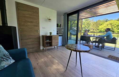 Sainte-Gemme Boat Rental | House Boat 'L'Othentique, Écolodge Flottant' with Lake View, Shared Garden and Air Conditioning