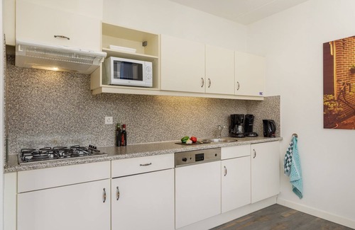 Volendam House | House in Volendam with Waterfront Views