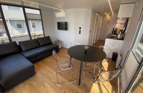 Lundby Boat Rental | Houseboat KUNGSVIKEN with roof terrace in the center of Gothenburg