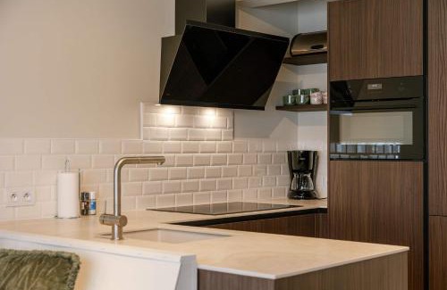 Heist Apartment | Huswell - Modern family flat steps from the sea