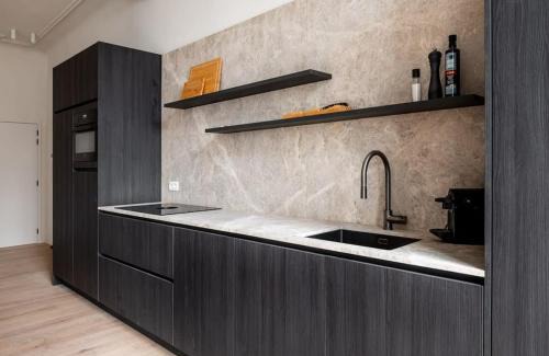 Kunstenkwartier Apartment | Huswell - Stylishly renovated apartment with city view