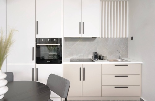 Limenas Chersonisou Apartment | Icos City 1. Luxury, spacious apartment with jacuzzi and private patio.