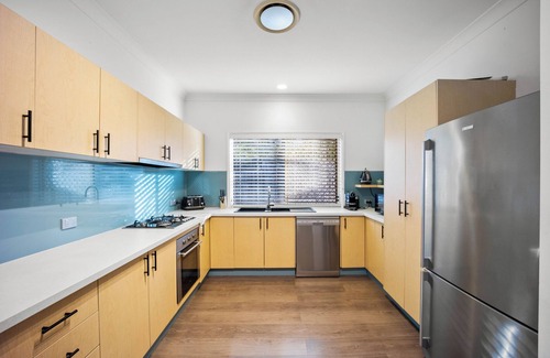 Gold Coast House | Immerse in the ultimate family getaway at our Burleigh Heads haven, where comfort meets charm!
