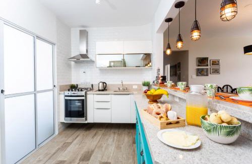 Vila Iara Apartment | Incrível Vista no Capivari com 4 Quartos e Lareira