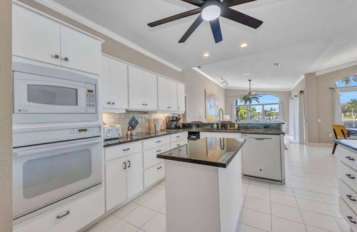 Burnt Store Isles House | INCREDIBLE WATER VIEW! NEW LUXURY REMODELED HOME; HEATED SALT POOL, GOLF NEARBY