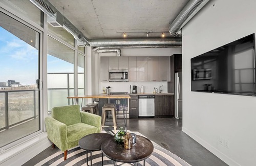 East Village Apartment | Industrial 1BR w Office, Views, AC, XL Patio