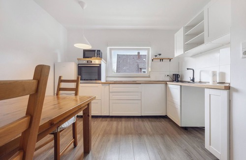 Hildesheim District House | Inn 'Haus Am Garten' with Private Terrace, Garden and Balcony