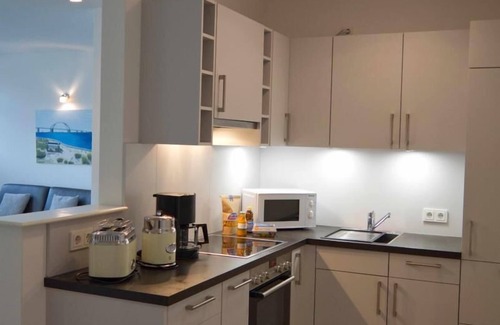 Burg auf Fehmarn Apartment | Inselblume 44 - vacation home with balcony in the center of Burg
