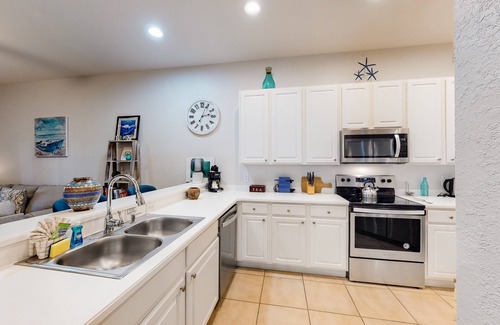 Bahama Bay Condo | Inviting ground-floor condo with homey ambience, water view, & resort amenities