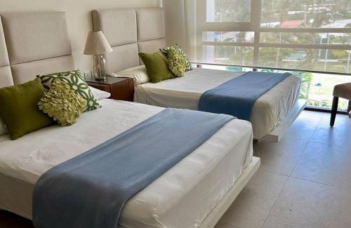 Playa Diamante Apartment | Isla Residences, frente al mar.