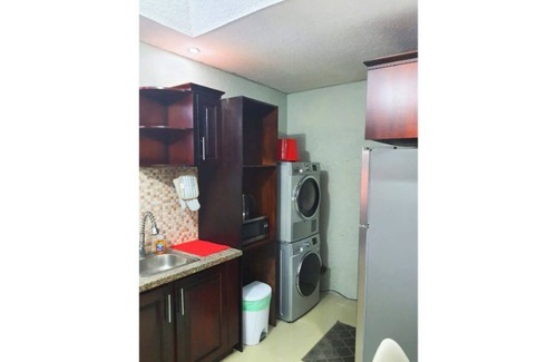New Kingston Condo | Island Odyssey - where comfort meets experience.