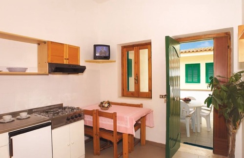 Santa Maria del Cedro House | Bungalows surrounded by greenery a stone's throw from the sea