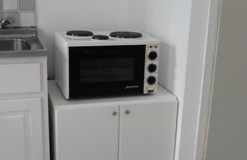 Heraklion Apartment | Julie's studio in Kokkini Hani, 2 mins walk to beach. Near famous theme parks!