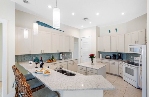 Coury House | Key Colony Oasis - Waterfront 5BR + Private Pool