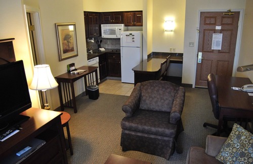 Okemos Condo | King Suite. Free Breakfast.