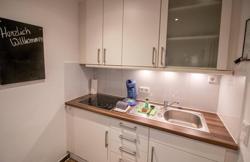 Greetsiel Apartment | Kutsche - Apartments in "Das Posthaus"