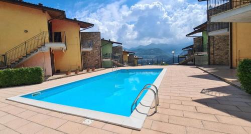 Tavernola Apartment | La casa di Gabry in residence con piscina comune