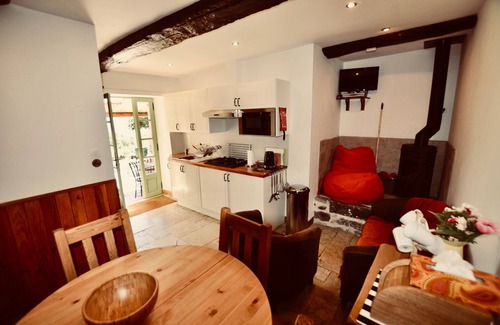 Riols Cottage | La Chataigne - stylish, family friendly gite with heated pool, playground and terraces
