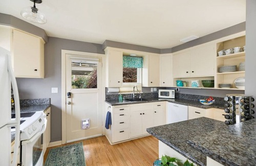Rainier Valley House | Lake Washington View Home with Hot Tub BBQ Garden