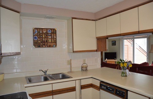Melvin Village Condo | Lake Winnipesaukee beachfront property.