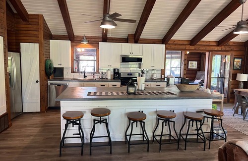 Nocona Cabin | Lakefront 3 bedroom/2 bath Log Cabin with Dock, Deck & Amazing Sunset Views!