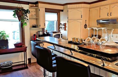 Labelle House | Lakefront Chalet with Private Spa, Dock, Games Room & Beach, Near Montreal