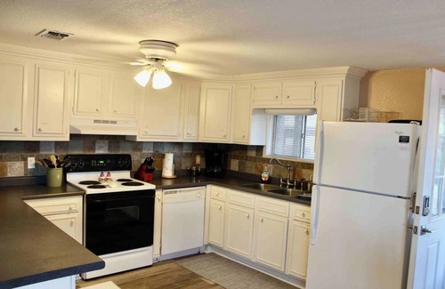 Nocona House | Lakefront | Dock | Fire pit | Sleeps 8