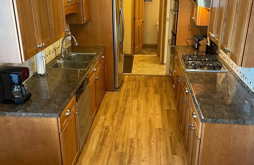 Lindstrom House | Lakefront Family Getaway! Pontoon Rentals-Kayak-Pedal Boat-Fire Pit-Sandy Beach