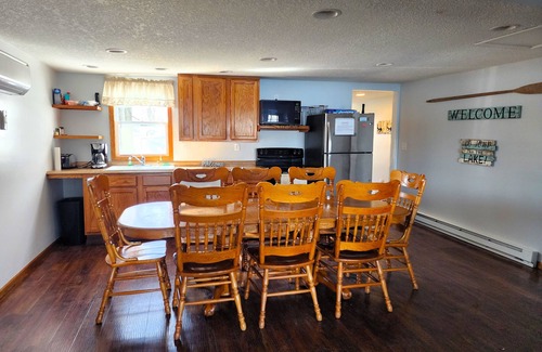 Coldwater House | Lakefront home w/Sunroom beach, kayaks, dock and laundry. 4 bd. Pet Friendly!