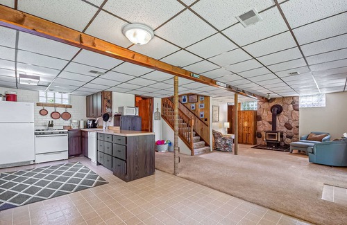 Johannesburg House | Lakefront home with large yard, dock, gas grill, WIFI near golf & ATV trails!