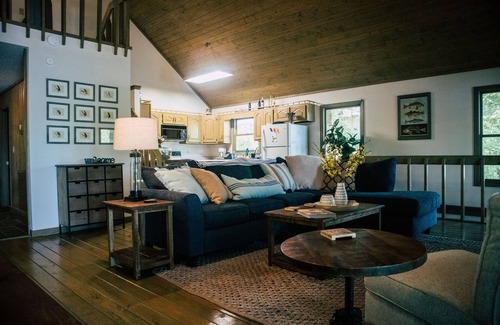 Ten Mile House | Lakefront house with dock, huge porch, game room