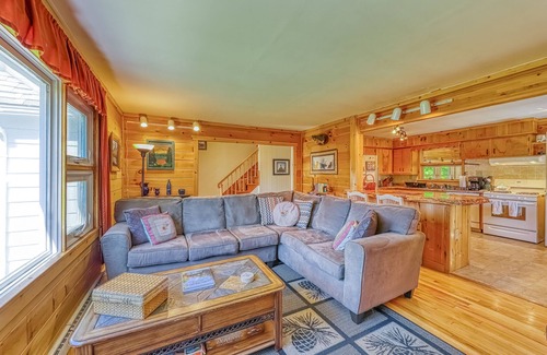 Brant Lake House | Lakefront house with 275' of waterfront, enclosed porch, & firepit