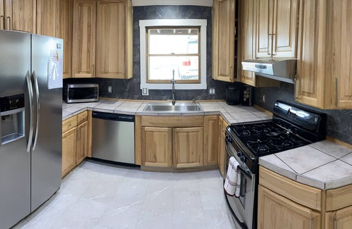 Brighton House | Lakefront Oasis - Premier, centrally located vacation property. Remodeled 2020.