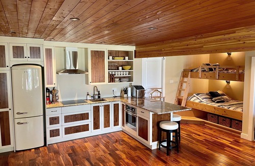 Sproat Lake Cabin | Lakefront, private dock, hot tub, free kayaks and paddle boards!