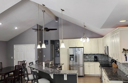 Littleton House | Lakefront single-story home, Flat lot! Huge game room!