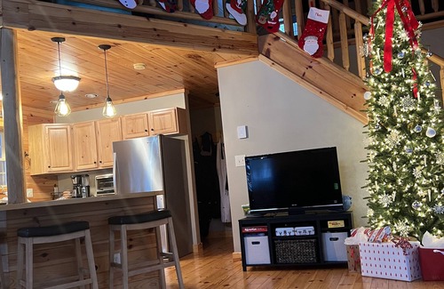 Elmira Cabin | Lakes of the North Cabin near trails - Access to Clubhouse with Pool and Hot Tub