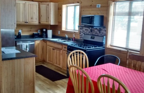 Elmira Cottage | LAKES OF THE NORTH GOLF, SNOWMOBILE, ORV, FISH, SWIM, HIKE, AND HUNTING COTTAGE
