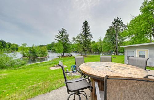 Holcombe House | Lakeside Cabin with Fire Pit Near Pine Point Park!