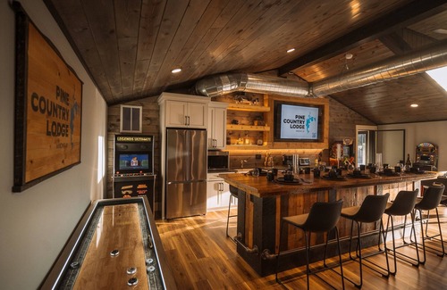Minong Cabin | Lakeside Mansion 10000SF - Heated Pool - Two Hot Tubs - Theater- Sleeps up to 62