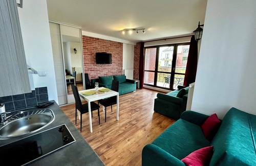 Ostroda Apartment | Lakeside Promenade View Sunset Studio