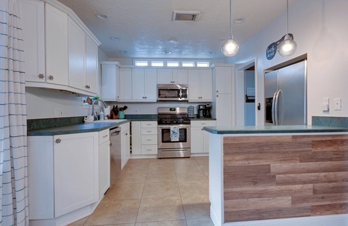 Cocoa Beach House | Large 3/3 pet friendly house across the street from the beach.
