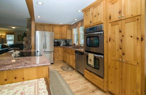 Clear Lake House | Large Family Lake Oasis with exquisite log furniture charm!