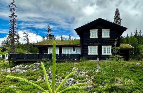 Ringsaker House | Large log cabin at Sjusjøen with sauna, fireplace and panoramic view
